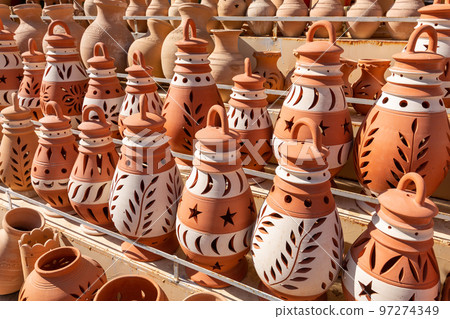 Hand Made Pottery in Nizwa Market. Clay Jars at the Rural Traditional Arabic Bazaar, Oman. Hand Made Pottery in Nizwa Market. Clay Jars at the Rural Traditional Arabic Bazaar, Oman. 97274349