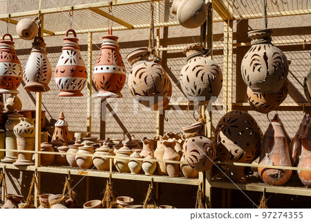 Hand Made Pottery in Nizwa Market. Clay Jars at the Rural Traditional Arabic Bazaar, Oman.  97274355