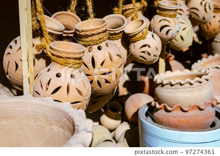 Hand Made Pottery in Nizwa Market. Clay Jars at the Rural Traditional Arabic Bazaar, Oman. Hand Made Pottery in Nizwa Market. Clay Jars at the Rural Traditional Arabic Bazaar, Oman. 97274361