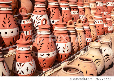 Hand Made Pottery in Nizwa Market. Clay Jars at the Rural Traditional Arabic Bazaar, Oman. Hand Made Pottery in Nizwa Market. Clay Jars at the Rural Traditional Arabic Bazaar, Oman. 97274368