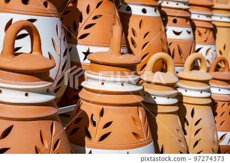 Hand Made Pottery in Nizwa Market. Clay Jars at the Rural Traditional Arabic Bazaar, Oman. Hand Made Pottery in Nizwa Market. Clay Jars at the Rural Traditional Arabic Bazaar, Oman. 97274373