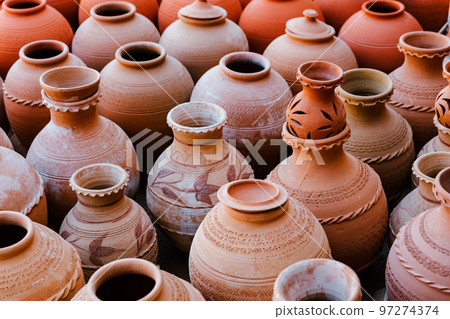 Hand Made Pottery in Nizwa Market. Clay Jars at the Rural Traditional Arabic Bazaar, Oman.  97274374