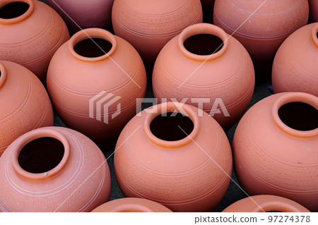 Hand Made Pottery in Nizwa Market. Clay Jars at the Rural Traditional Arabic Bazaar, Oman. Hand Made Pottery in Nizwa Market. Clay Jars at the Rural Traditional Arabic Bazaar, Oman. 97274378