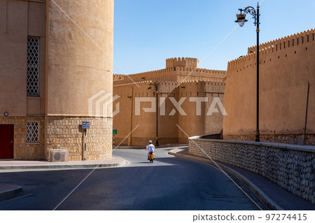 Nizwa city walls. Traditional medieval architecture in Nizwa, Oman.  97274415