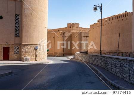 Nizwa city walls. Traditional medieval architecture in Nizwa, Oman.  97274416