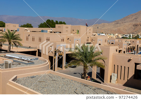 Nizwa city walls. Traditional medieval architecture in Nizwa, Oman.  97274426
