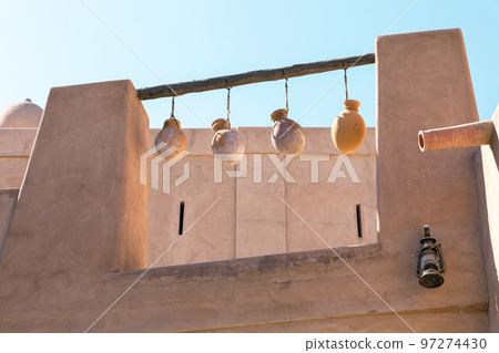 Nizwa city walls. Traditional medieval architecture in Nizwa, Oman.  97274430