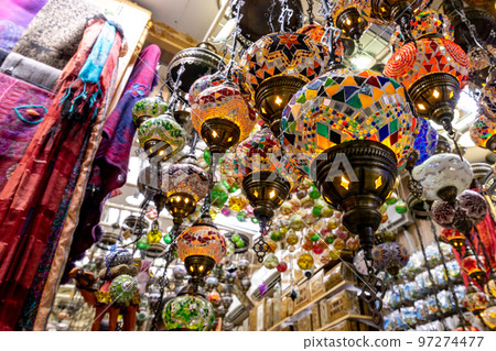 Souvenirs exhibited in market shops of the old town Nizwa. Oman. Arabian Peninsula. Souvenirs exhibited in market shops of the old town Nizwa. Oman. Arabian Peninsula. 97274477