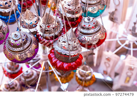 Souvenirs exhibited in market shops of the old town Nizwa. Oman. Arabian Peninsula.  97274479