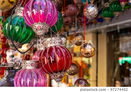 Souvenirs exhibited in market shops of the old town Nizwa. Oman. Arabian Peninsula. Souvenirs exhibited in market shops of the old town Nizwa. Oman. Arabian Peninsula. 97274482