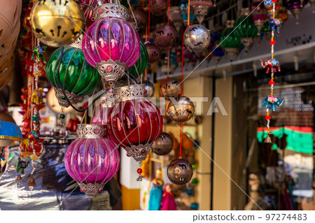 Souvenirs exhibited in market shops of the old town Nizwa. Oman. Arabian Peninsula.  97274483