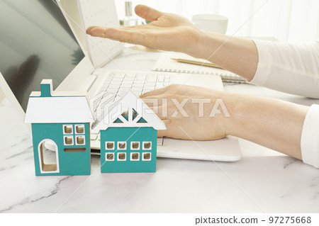House image and woman's hand House image and woman's hand 97275668