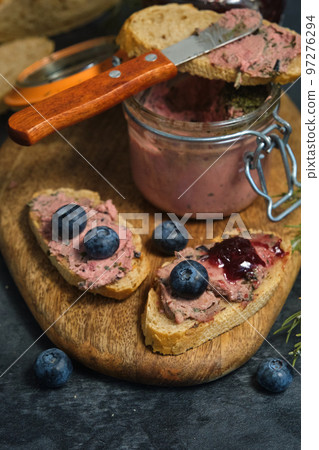 sandwiches with pate and blueberries 97276294