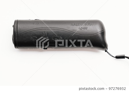 Ultrasonic dog repeller for protection and training on a white background. Ultrasonic dog repeller for protection and training on a white background. 97276932