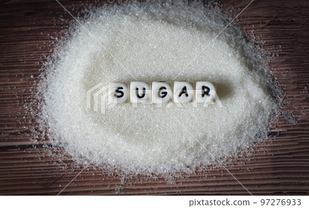 Sugar on table background, white sugar for food and sweets dessert candy heap of sweet sugar crystalline granulated Sugar on table background, white sugar for food and sweets dessert candy heap of sweet sugar crystalline granulated 97276933