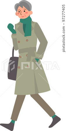Senior woman walking wearing a trench coat 97277405