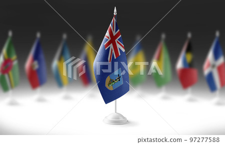 The national flag of the Montserrat on the background of flags of other countries The national flag of the Montserrat on the background of flags of other countries 97277588