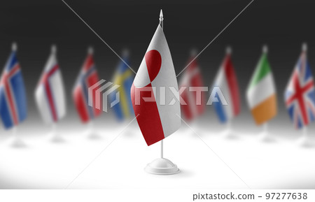 The national flag of the Greenland on the background of flags of other countries The national flag of the Greenland on the background of flags of other countries 97277638