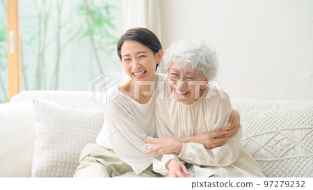 Senior middle-aged woman with a smile, elderly mother and daughter 97279232