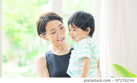 Women playing with boys Mother and child childcare 97279234