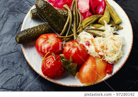 Assorted mixed pickled vegetables in plate Assorted mixed pickled vegetables in plate 97280192