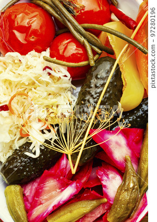 Tasty homemade pickles vegetables. 97280196