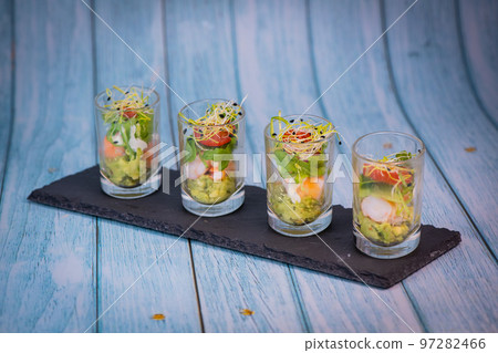 Avocado shrimp arugula mayonaise, espelette pepper and lemon, leek sprouts recipe 97282466