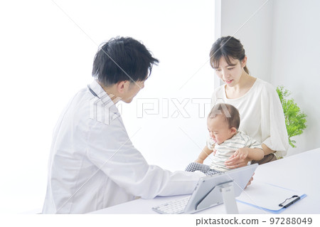Baby undergoing checkup Baby undergoing checkup 97288049