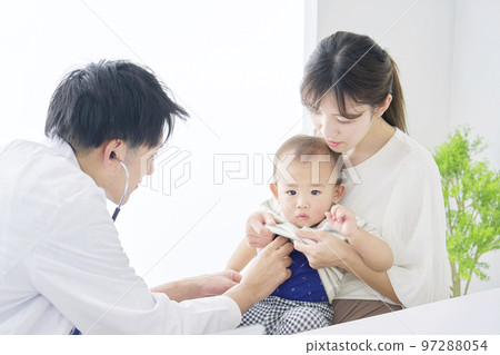 Baby undergoing checkup 97288054