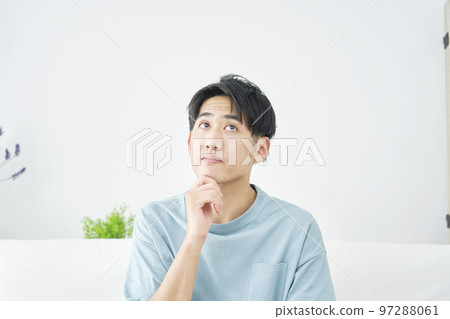 man thinking at home man thinking at home 97288061