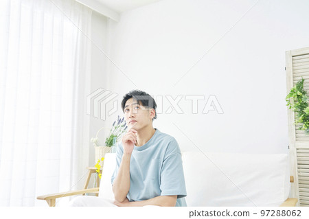 man thinking at home man thinking at home 97288062