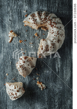 pieces of gugelhupf cake covered with a vanilla frosting 97288686