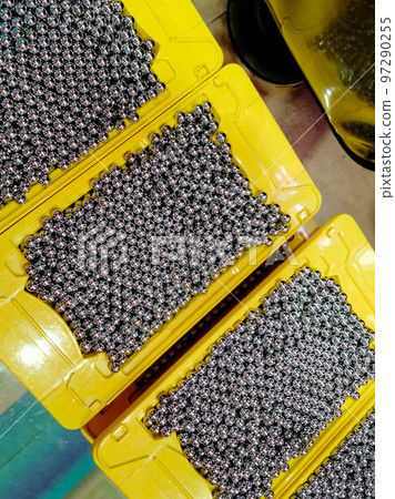 A dollar box containing a large amount of pachinko balls A dollar box containing a large amount of pachinko balls 97290255