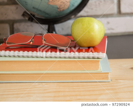 World teachers ' Day in school. Still life with books, globe, Apple, glasses 97290924