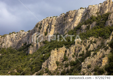 Mountain Landscape Background. Sunset Sky with Sunrays. Near Dorgali, Sardinia, Italy. 97292740
