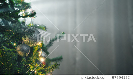 Light beam over the Christmas tree indoor 97294152