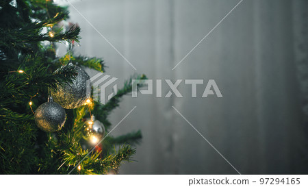 Light beam over the Christmas tree indoor Light beam over the Christmas tree indoor 97294165