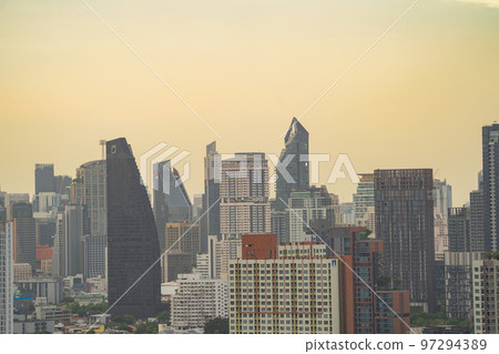 Aerial view of Bangkok Downtown Skyline, Thailand. Financial district and business centers in smart urban city in Asia. Skyscraper and high-rise buildings at sunset. 97294389