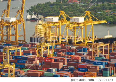 Aerial view of container cargo ship in the export and import business and logistics international goods in urban city. Shipping to the harbour by crane in Bangkok harbour, Thailand. 97294423