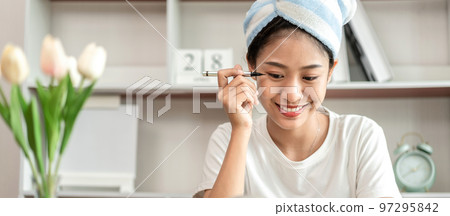 Half Japanese woman putting on makeup and hair to prepare for work in the morning, Facial care and cosmetics, Make up mirror, Take a shower and put on make-up and get dressed and ready to go to work Half Japanese woman putting on makeup and hair to prepare for work in the morning, Facial care and cosmetics, Make up mirror, Take a shower and put on make-up and get dressed and ready to go to work 97295842