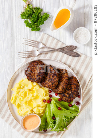 fried minced liver patties with potato mash fried minced liver patties with potato mash 97296185