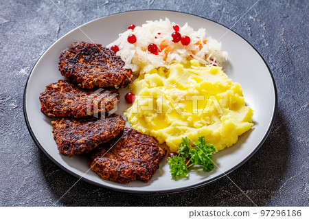fried minced liver patties with potato mash fried minced liver patties with potato mash 97296186