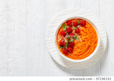 Sweet Potato Mash topped with fresh Raspberries Sweet Potato Mash topped with fresh Raspberries 97296191