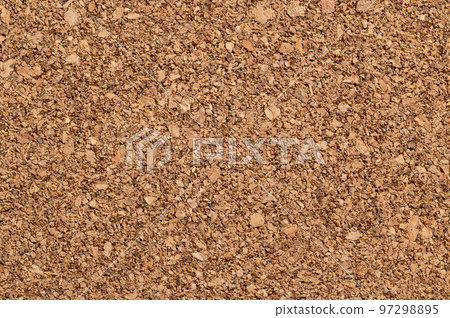 Untreated cork panel, close-up of the coarse texture of rough grained cork oak, Quercus suber. Used as decorative panels and veneers for coaster, bulletin boards, floor and wall tiles. Macro photo. 97298895