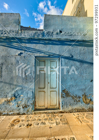 Mysterious white door to a house or venue in Santa Cruz de La Palma in Spain. Beautiful cultural and traditional architecture in a small village. Old and ancient exterior of a building structure Mysterious white door to a house or venue in Santa Cruz de La Palma in Spain. Beautiful cultural and traditional architecture in a small village. Old and ancient exterior of a building structure 97299931