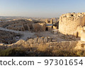 Mount Herodion and the ruins of the fortress of King Herod inside an artificial crater. The Judaean Desert, West Bank. 97301654