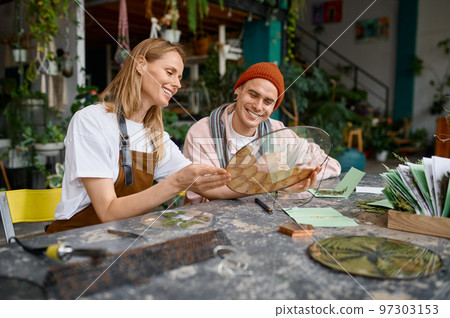 Young decorators working at craft studio 97303153