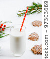 Milk and Christmas cookies for Santa. Christmas background. gingerbread cookies 97303669