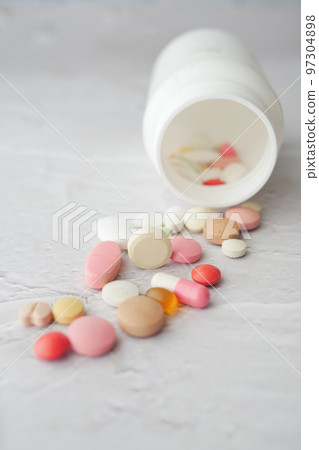 Close up of many colorful pills and capsules Close up of many colorful pills and capsules 97304898