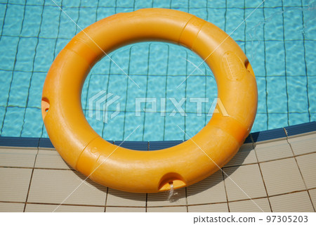 Red life buoy in swimming pool.. Help and support concept. Red life buoy in swimming pool.. Help and support concept. 97305203